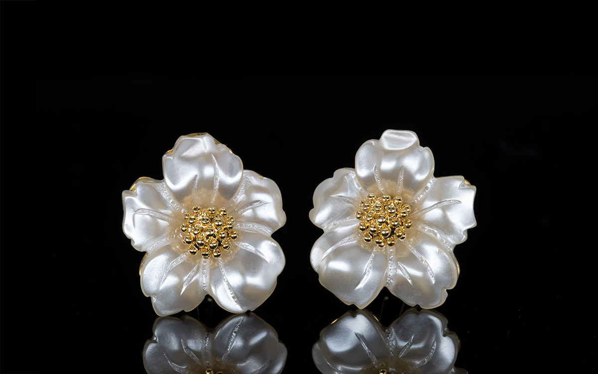 italian pearl flower clip earrings with gold center product photography