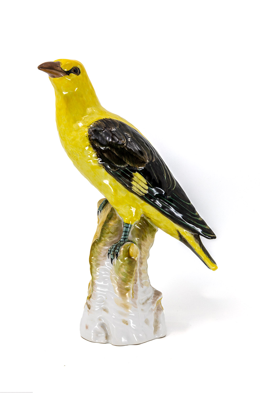 yellow and black ceramic bird product photography